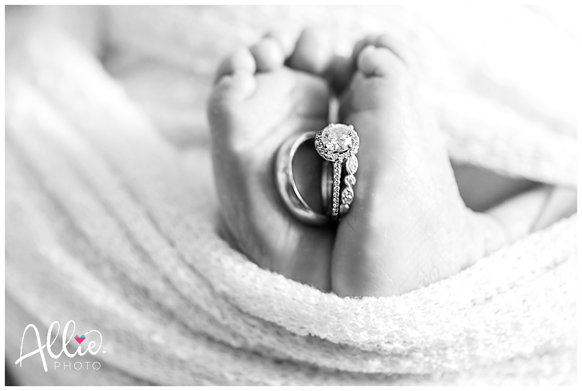 baby feet with wedding rings newborn lifestyle photos