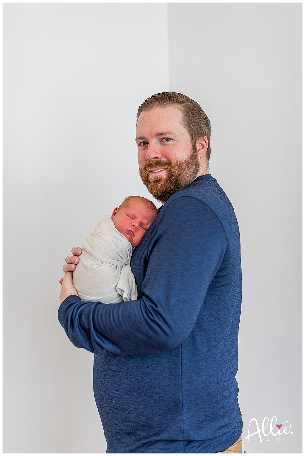 daddy and newborn baby studio photos