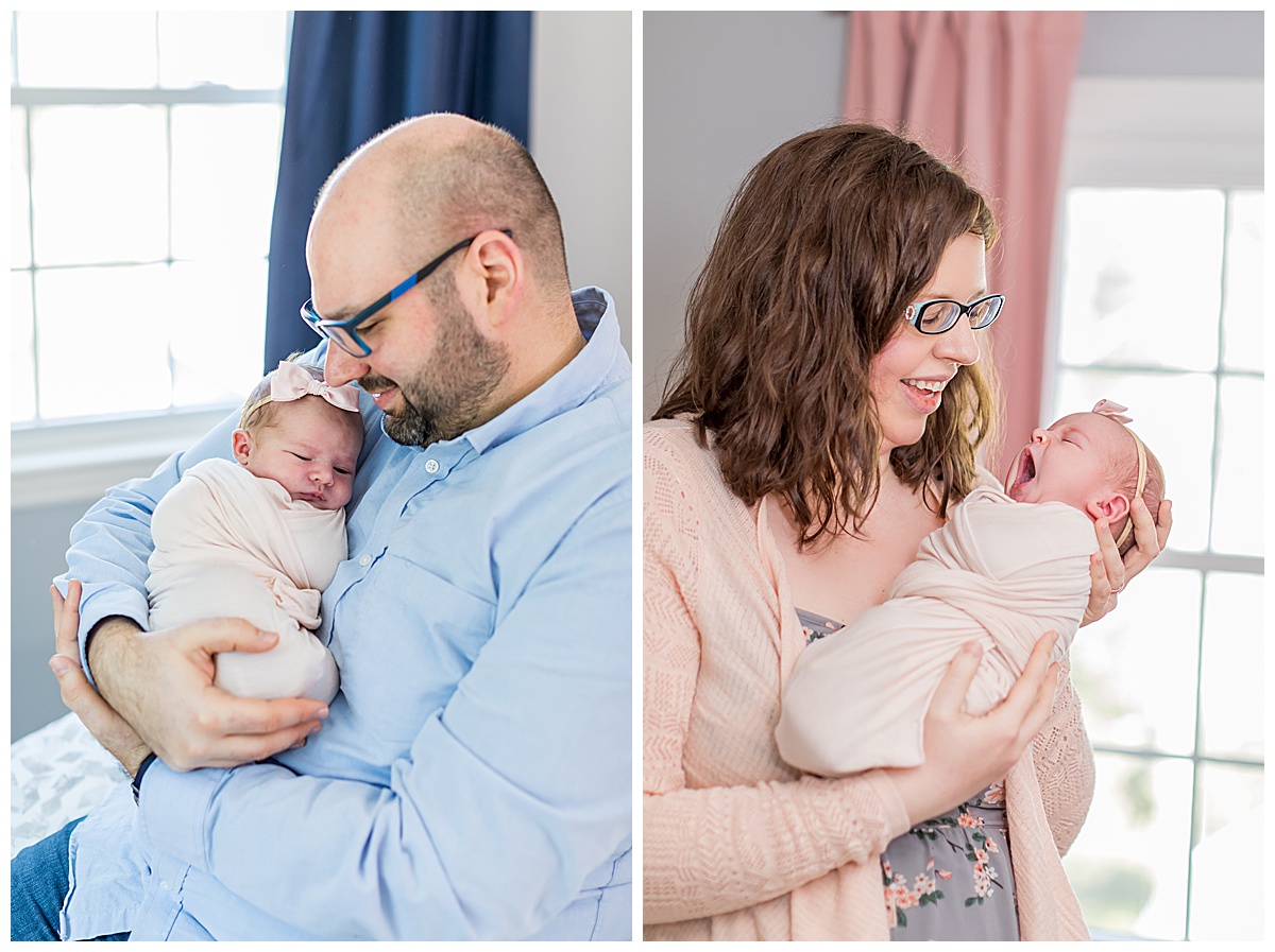 mom and dad with newborn baby girl at home photos