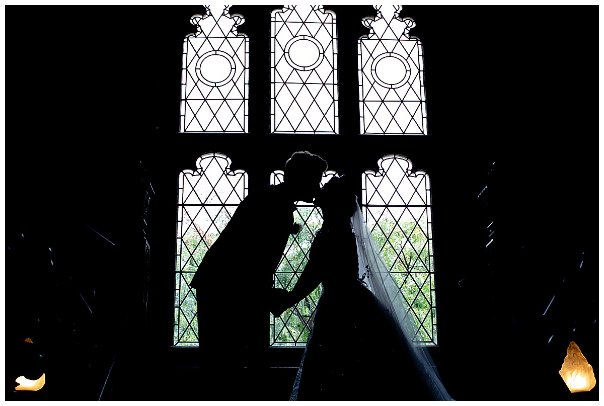 boston university castle wedding on staircase silhouette