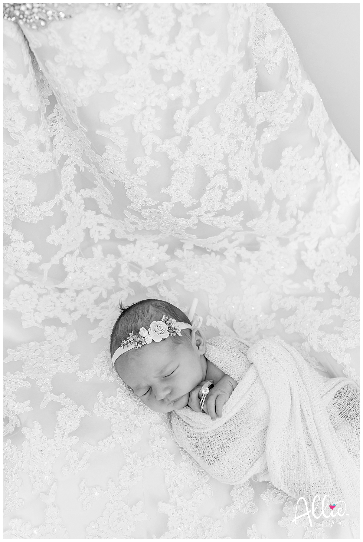 newborn photos at home with wedding dress
