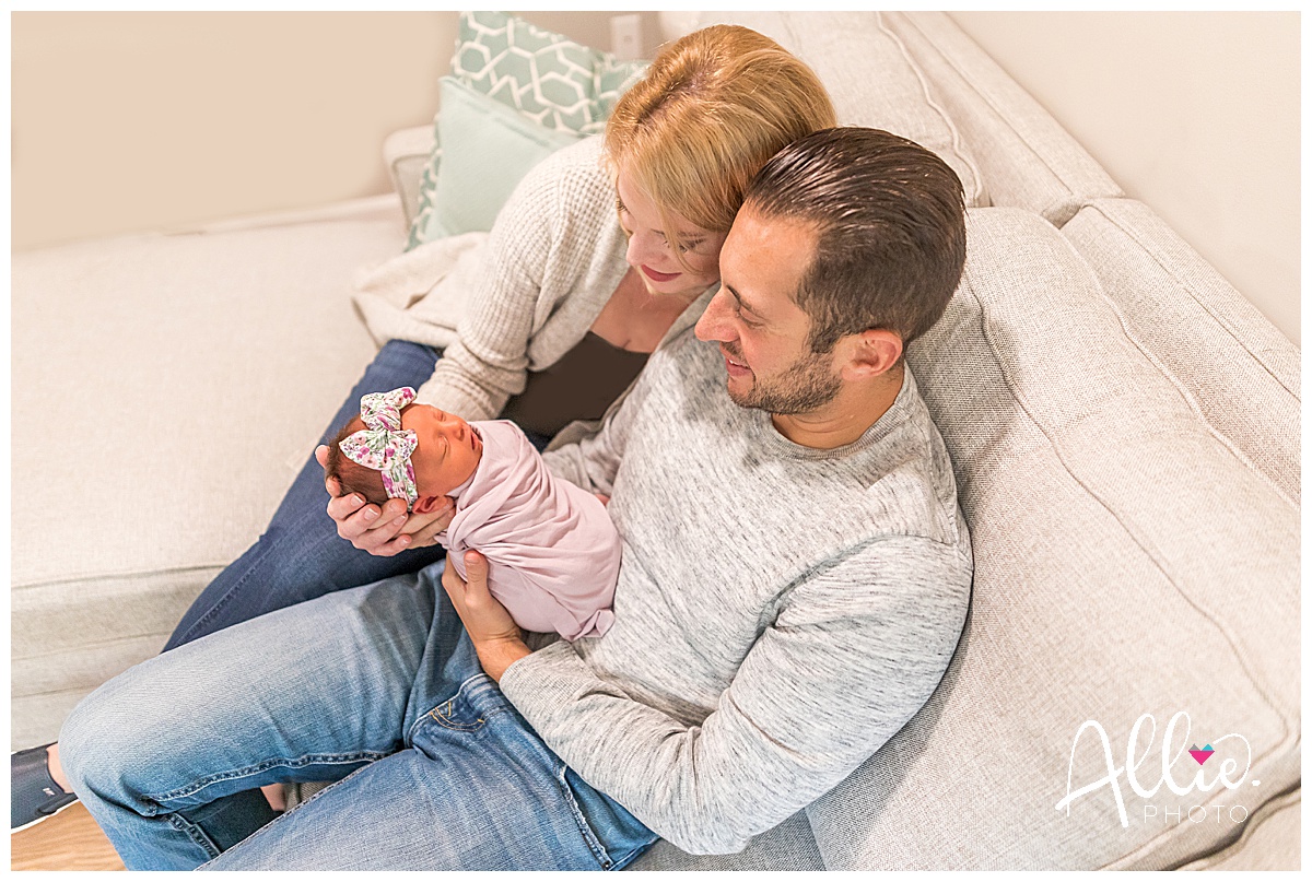 at-home newborn photos with baby parents 