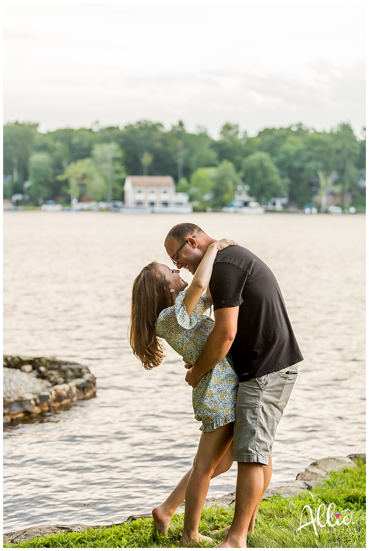 bride and groom dip kiss lakeside