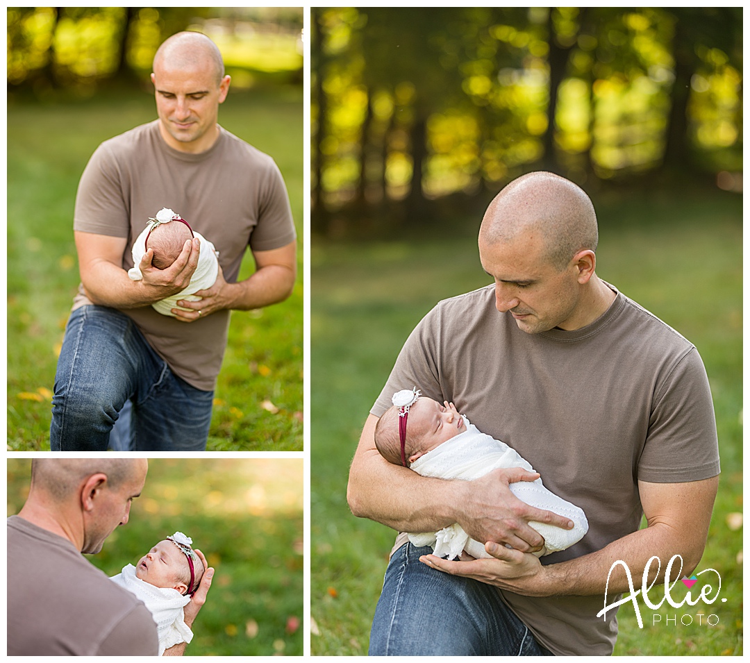 daddy holding baby girl outdoor newborn photos