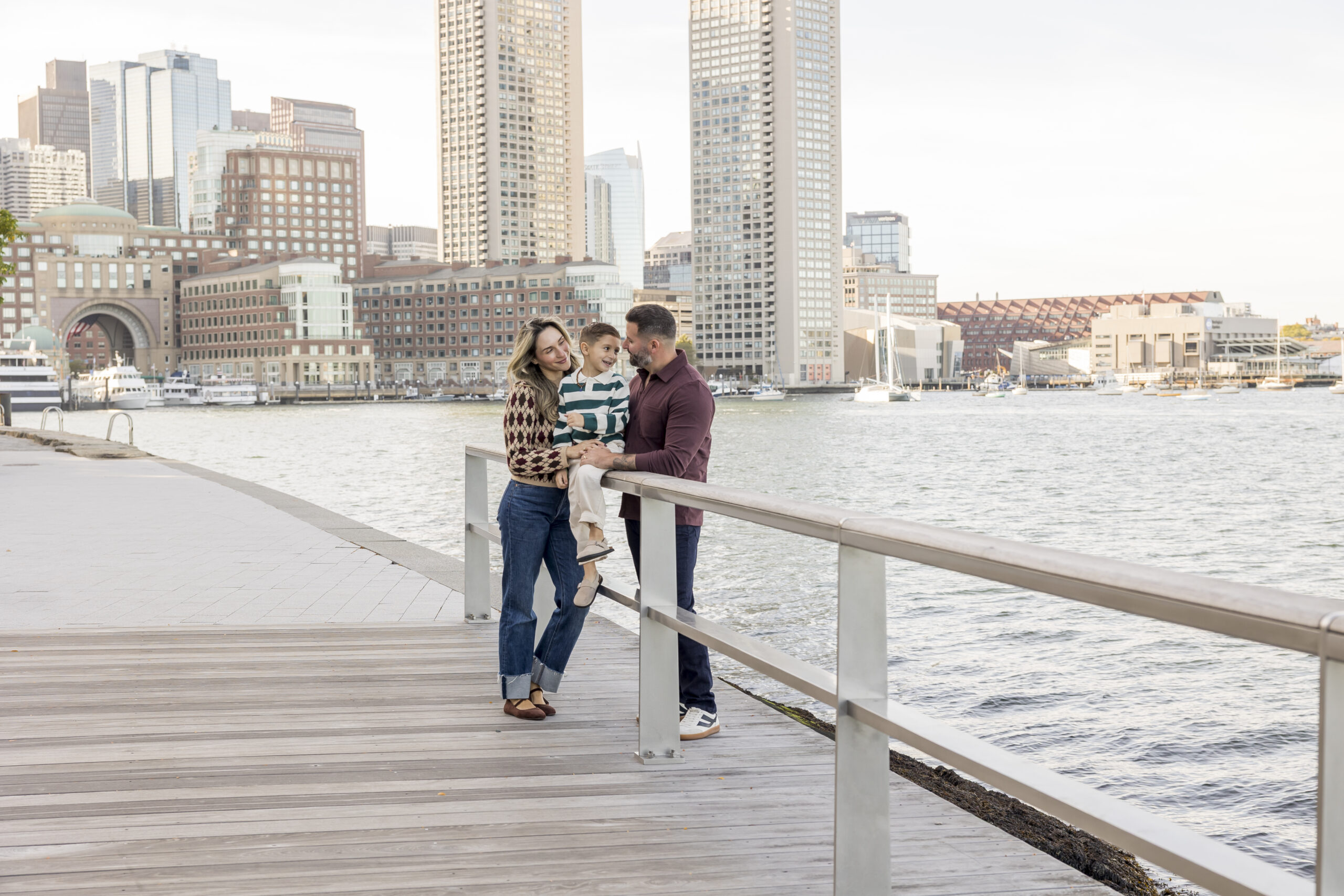 A fall family photo session in Boston’s Seaport with natural, joyful images and perfect style. Ideal inspiration for families searching for Boston photographers.